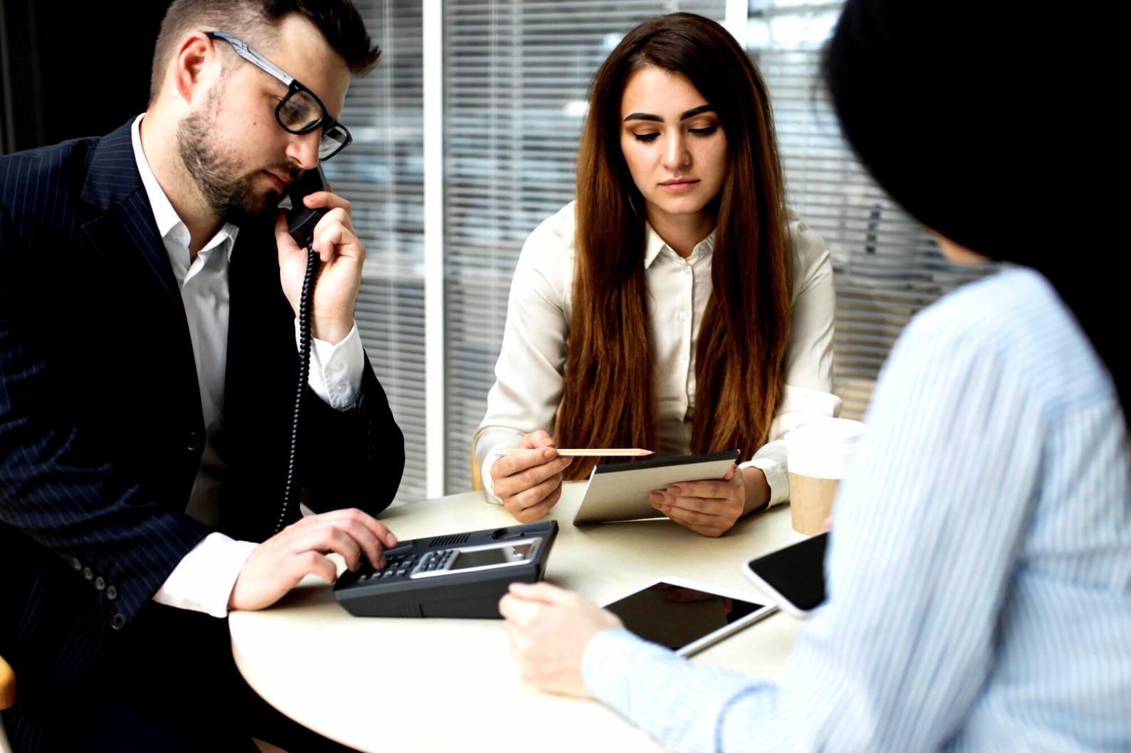 Cybersecurity analyst reviewing financial institution threat assessment data